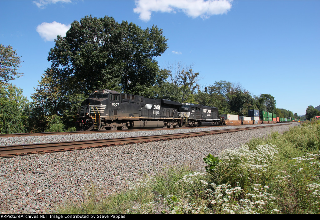 NS 8007 takes train 23M through MP116